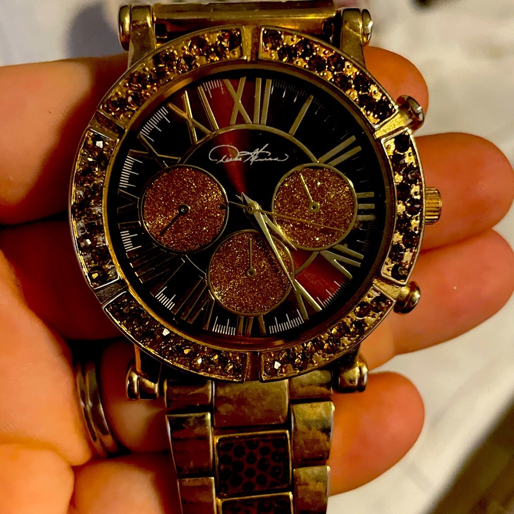 Womans copper and rhinestone watch